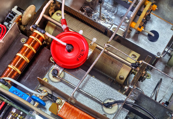 Inside view of high frequency power amplifier with capacitors, coils and other components