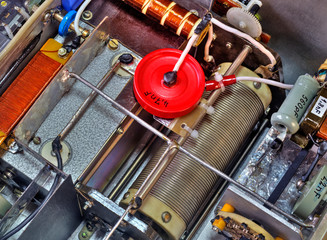 Inside view of high frequency power amplifier with capacitors, coils and other components