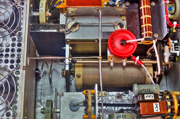 Inside view of high frequency power amplifier with capacitors, coils and other components