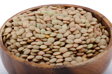 dry green lentils in bowl