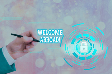 Writing note showing Welcome Abroad. Business concept for something that you say when someone gets...