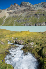 Fototapeta na wymiar picturesque landscape with wild nature and glacial lake in the Pennine Alps, canton of Valais, Switzerland