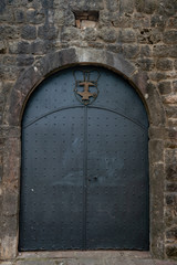 the metal door of an old building