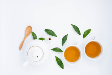 teapot and tea on white  background, over light