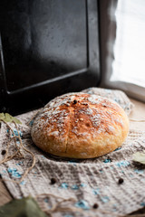 Bread on the wooden background 