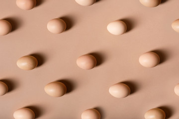 Brown eggs on brown background 