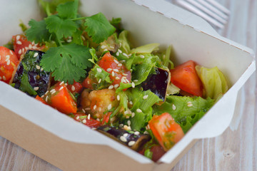 vegetable salad in a delivery container