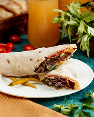 meat roll in pita bread and pepper