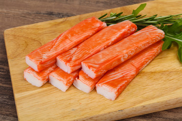 Crab stick surimi over board