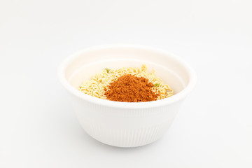 Instant cup ramen on white background
