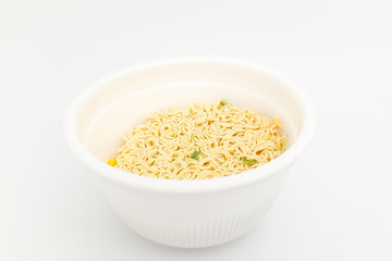 Instant cup ramen on white background