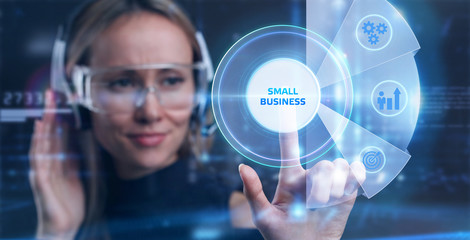 Business, Technology, Internet and network concept. Young businessman working on a virtual screen of the future and sees the inscription: small business
