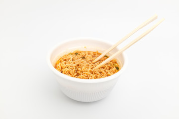 Instant cup ramen on white background