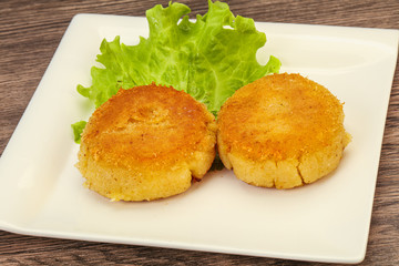 Vegan cuisine - Potato cutlet in the plate