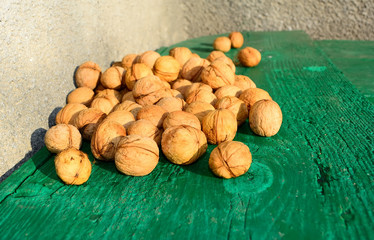 Top view of a walnut on a wooden stand