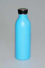 thermal stainless steel bottle blue on grey background