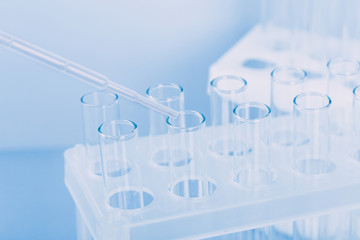 A pipette that adds fluid to one of several tubes. Lab tests