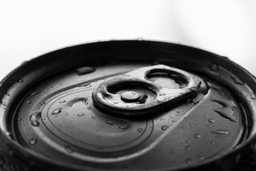 Close up of soda can with focus on opening seal 