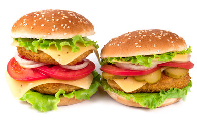 Two delicious hamburgers isolated on white background