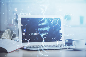 Desktop computer background and DNA drawing. Double exposure. Science concept.