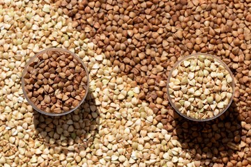 Background of raw and fried buckwheat