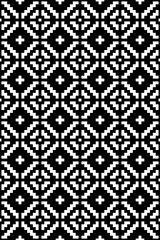 Geometric ornament of rhombuses and flowers in the native American style. Seamless pattern for web, print, textile, wallpaper, card, wrapping paper and background