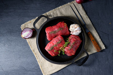 raw beef roulades prepared for cooking