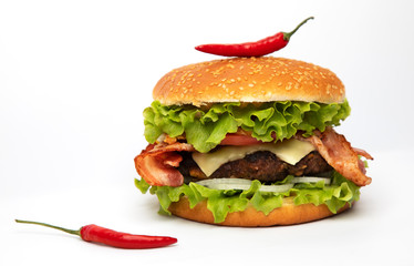 
Hamburger with bacon and chili pepper on a white background