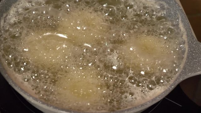 View footage of frying in boiling hot oil