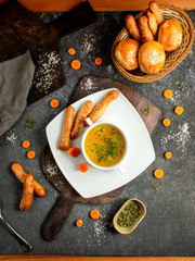 vegetable soup on a broth sprinkled with herbs