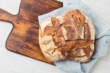 Fresh organic artisan bread. Healthy eating, buy local, bread recipes concept. Top view, flat lay