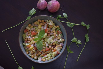 closeup view of chickpea salad(channa chat) with space to add text