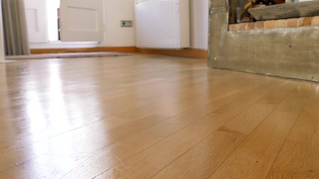 detail of a man's booties dressed in white pants