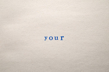 a YOUR word stamped on a piece of paper.