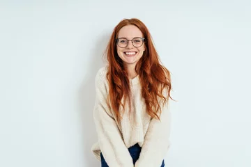 Foto op Canvas Smiling friendly young woman wearing spectacles © contrastwerkstatt