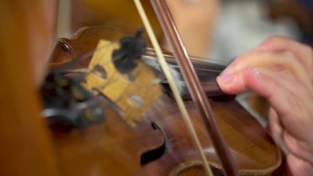 playing the violin close-up of a violinist woman