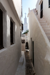 The narrow and white streets of Binibequer in the island of Menorca, Balearic islands, Spain