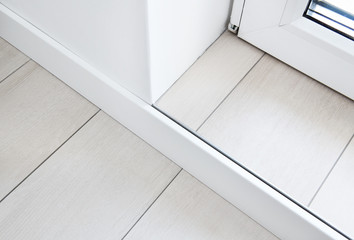 The floor is made of ceramic tiles, granite. Imitation of a wooden board. Connection of a floor...