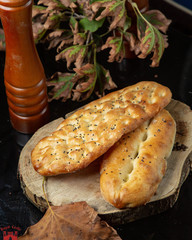 freshly baked bread and salt grinder on the table