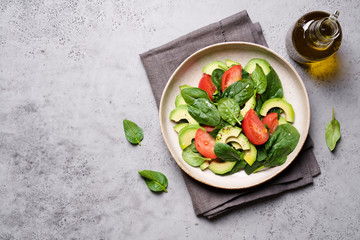 Strawberry Avocado Spinach Salad with Mint. Clean eating concept