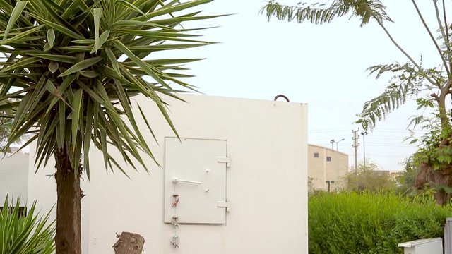 Mobile bomb shelter inside a home garden in Israel. This is an extra Fortified Room that helps the house residents to be protected from rocket fire attacks. It called Migunit" or "Merkhav Mugan"."