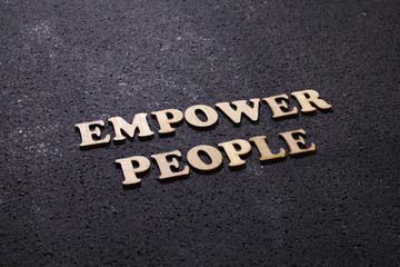 Empower people, business motivational inspirational quotes, wooden words typography lettering concept