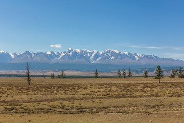 View of Belukha Mountain. Russia. Snow mountains of Altai. Belukha the highest peak of Siberia