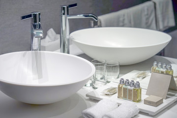 Interior of bathroom with washbasin and faucet. Bathroom interior sink with modern design in luxury hotel.