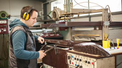 Technician make object on 3D sublimation vacuum heat press machine