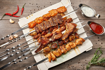 Barbecue. Grilled Pieces of Chicken, Beef, Pork on Charcoal.