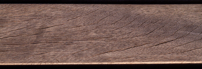 A single worn wooden board