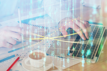 Double exposure of data internet theme hologram with man working on computer on background. Concept of innovation.