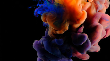 Color paint drops in water , abstract color mix , drop of Ink color mix paint falling on water Colorful ink in water,  
