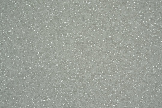 Texture of styrofoam with sunlight behind